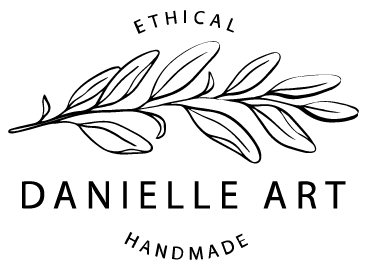 Danielle Art logo with a minimalist branch illustration and the words “DANIELLE ART” centered below, with “ETHICAL” above and “HANDMADE” below.
